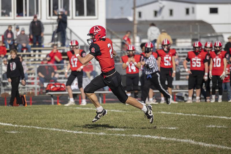 Amboy’s Eddie Jones picks up big yards against West Central Saturday, Nov. 2, 2024, in the 8-man football league first round playoffs.