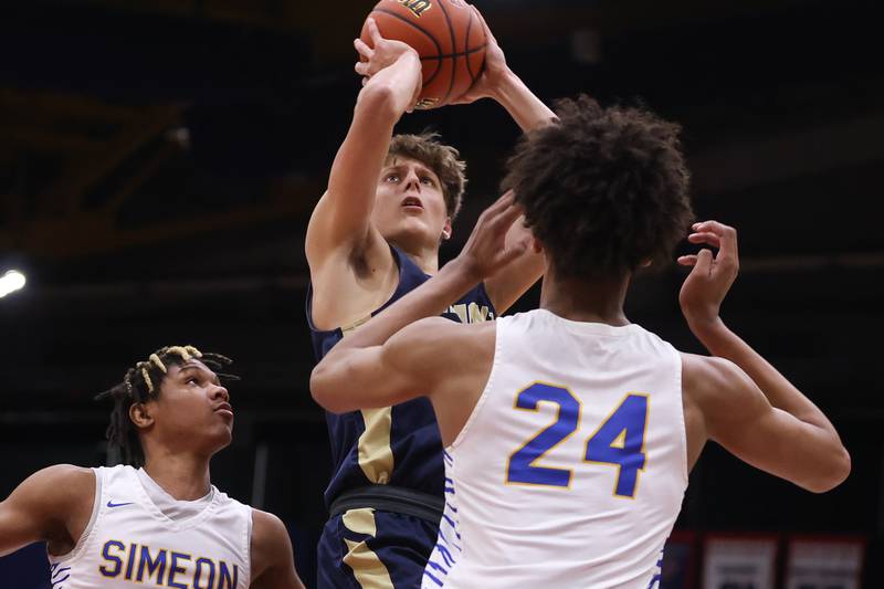 Lemont’s Nojus Indrusaitis takes a shot against Simeon in the Class 3A super-sectional at UIC. Monday, Mar. 7, 2022, in Chicago.