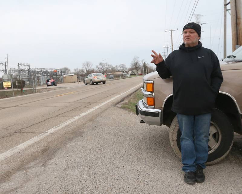 Oglesby mayoral candidate James Cullinan waves to people as they pass by Illinois Route 251 across the street from the Oglesby Fire Station on Tuesday, April 4, 2023 in Oglesby.