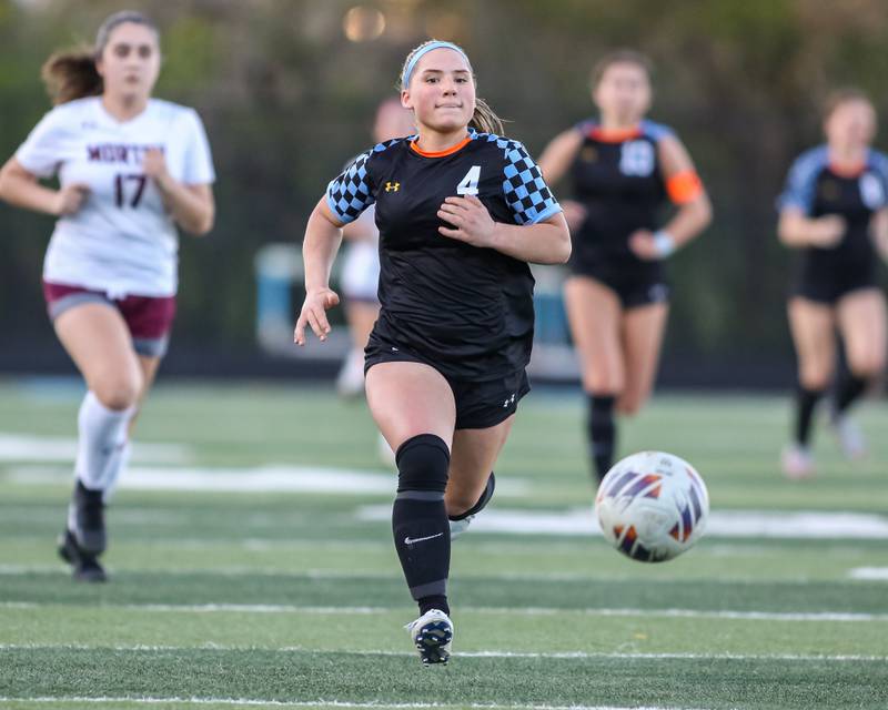 Willowbrook's Lillian Macias (4) chases the ball down the pitch during soccer match between Morton at Willowbrook.  April 15, 2024.