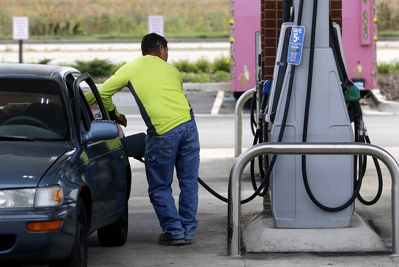 Gas in pumped into a car Wednesday, Sept. 20, 2023, at the Thorntons on Illinois Route 120 in McHenry.  The McHenry County Board voted Tuesday night to raise the county’s tax on gasoline next year to eight cents per gallon from the current 4.7 cents per gallon.