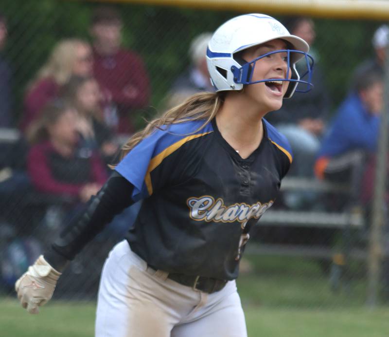 Aurora Central Catholic’s Morgan Vaghy celebrates after scoring against Marengo in varsity girls softball IHSA Class 2A Regional Title Game action on Friday, May 22, 2026 at Raymond Benoy Field on the campus of Marian Central High School in Woodstock.