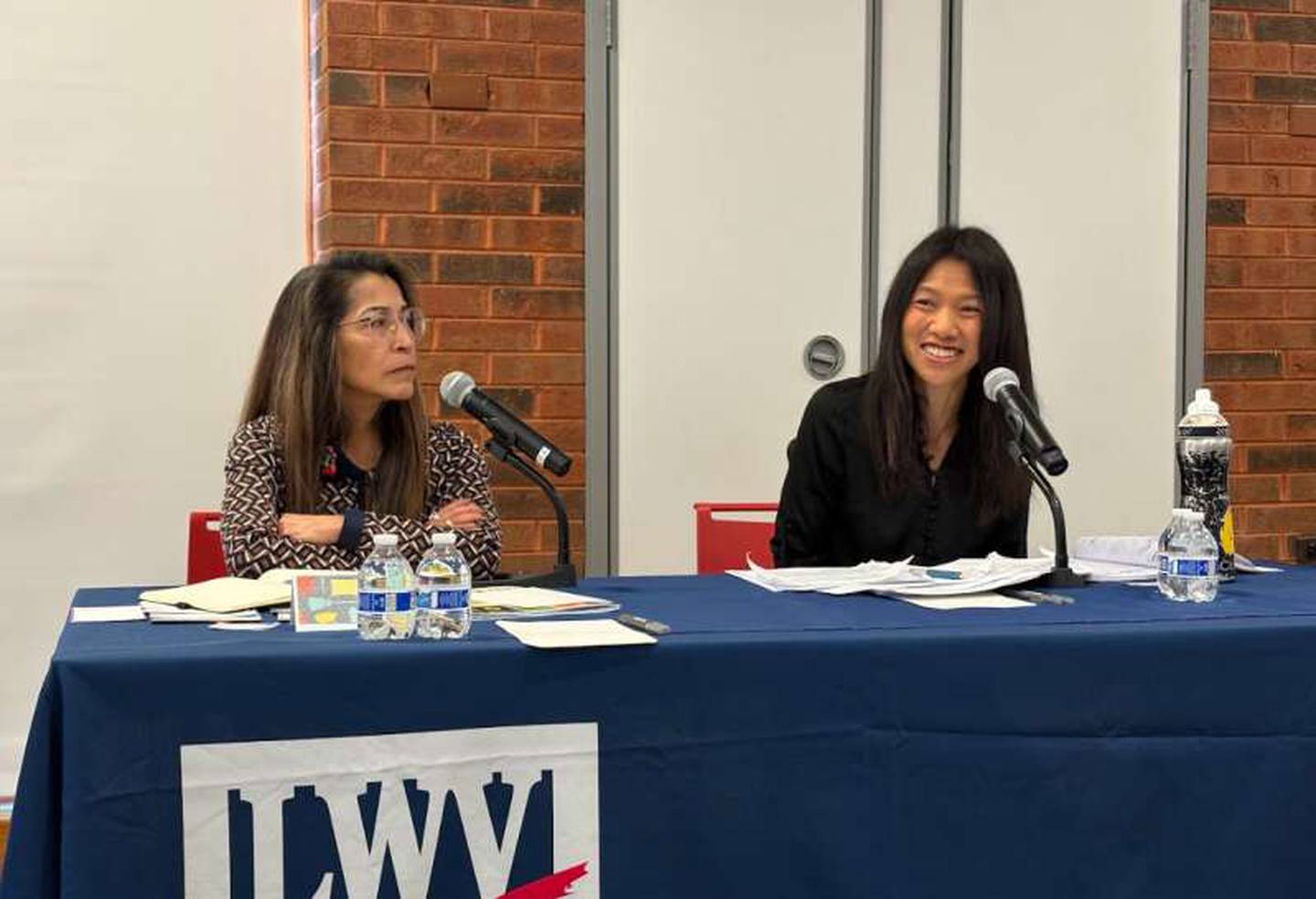 Erin Chan Ding, right, speaks at the League of Women Voters forum Saturday, Feb. 14, 2026, at the Barrington Area Public Library.