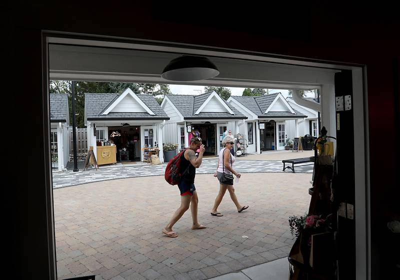 People shop at the McHenry Riverwalk Shoppes, on Friday, Aug.15, 2025, during McHenry’s 815 Day.