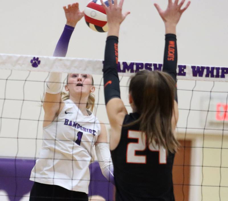 Hampshire’s Elizabeth King hits the ball against Libertyville in an IHSA volleyball Class 4A Sectional Championship at Hampshire High School in Hampshire on Thursday, November 6, 2025.