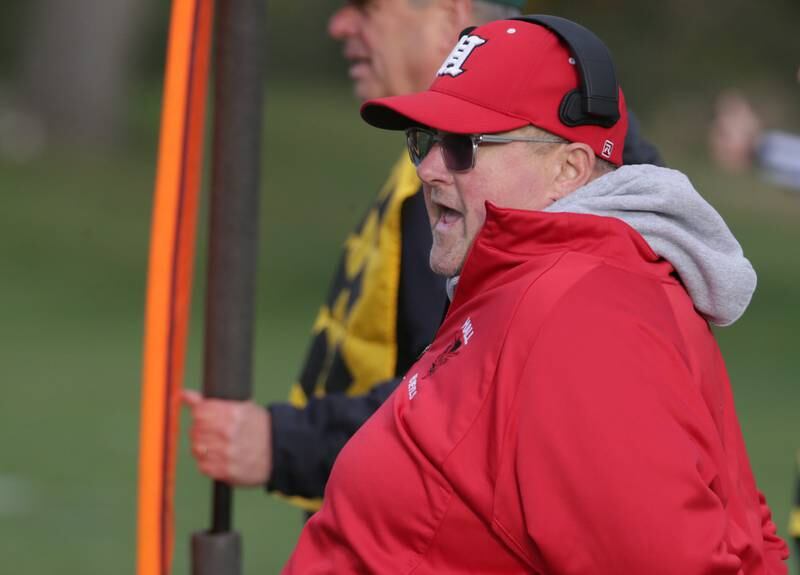 Hall football coach Randy Tieman calls plays on the sidelines against St. Bede on Saturday, Oct. 15, 2022 at the Academy in Peru.