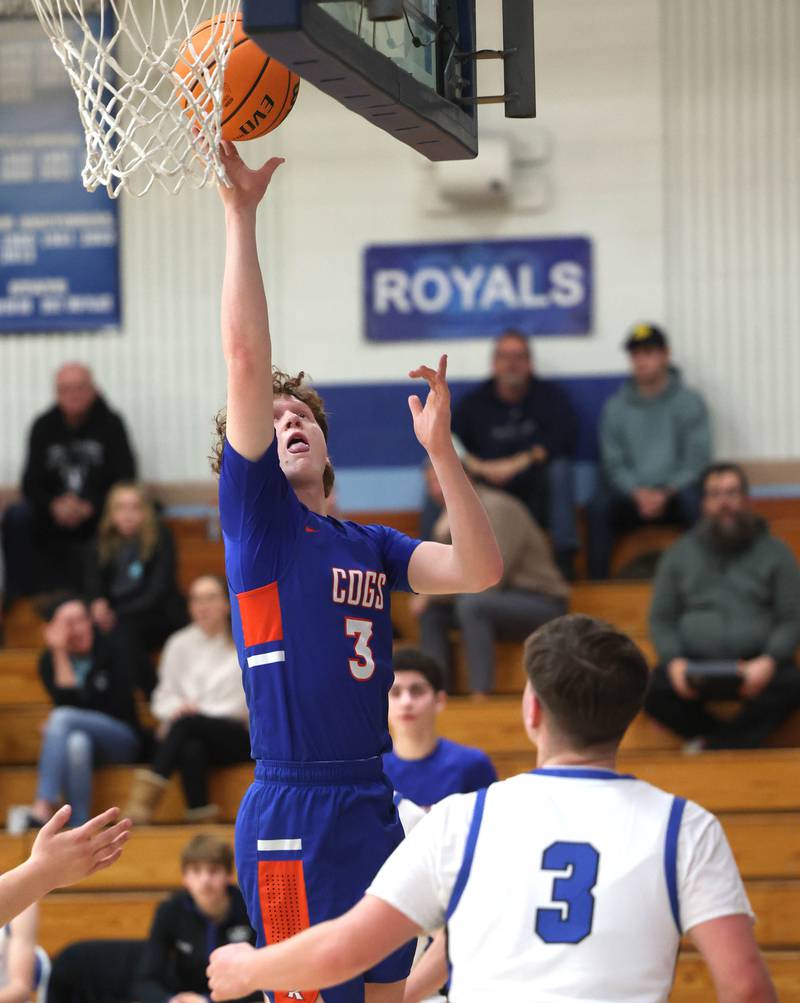 Genoa-Kingston's Jack Peterson shoots a layup over Hinckley-Big Rock's Austin Roop during their game Tuesday, Jan. 7, 2025, at Hinckley-Big Rock High School.