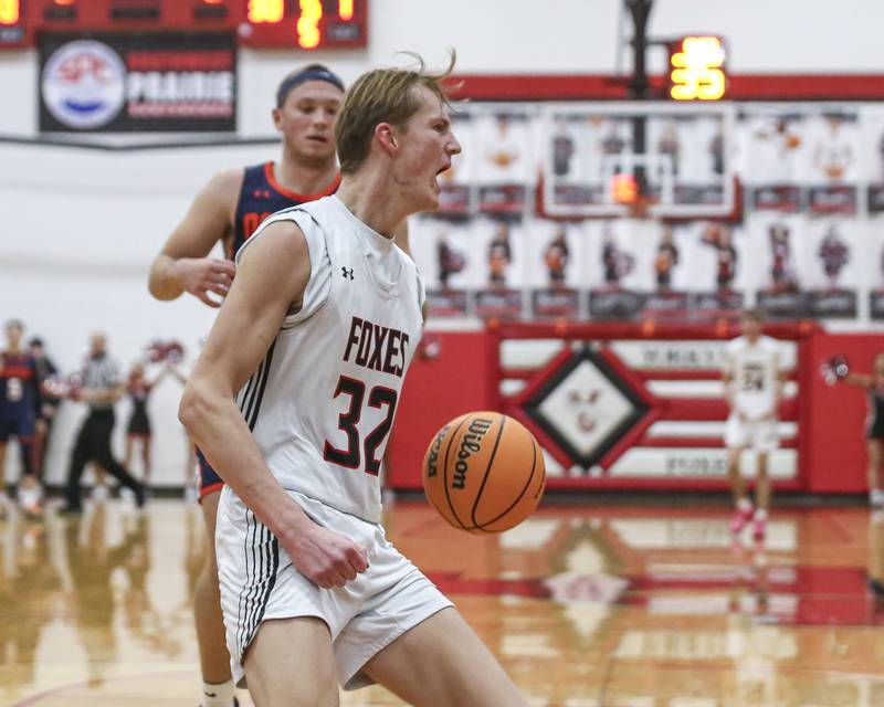 Yorkville's Joey Jakstys (32) yells out after dunking during their basketball game between Oswego at Yorkville Friday, Dec 12, 2025 in Yorkville.