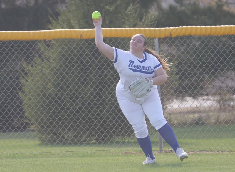 Newman's right fielder Irelynne Wren throws the ball back to the infield against Bureau Valley on Monday, March 30, 2026 at Bureau Valley High School.