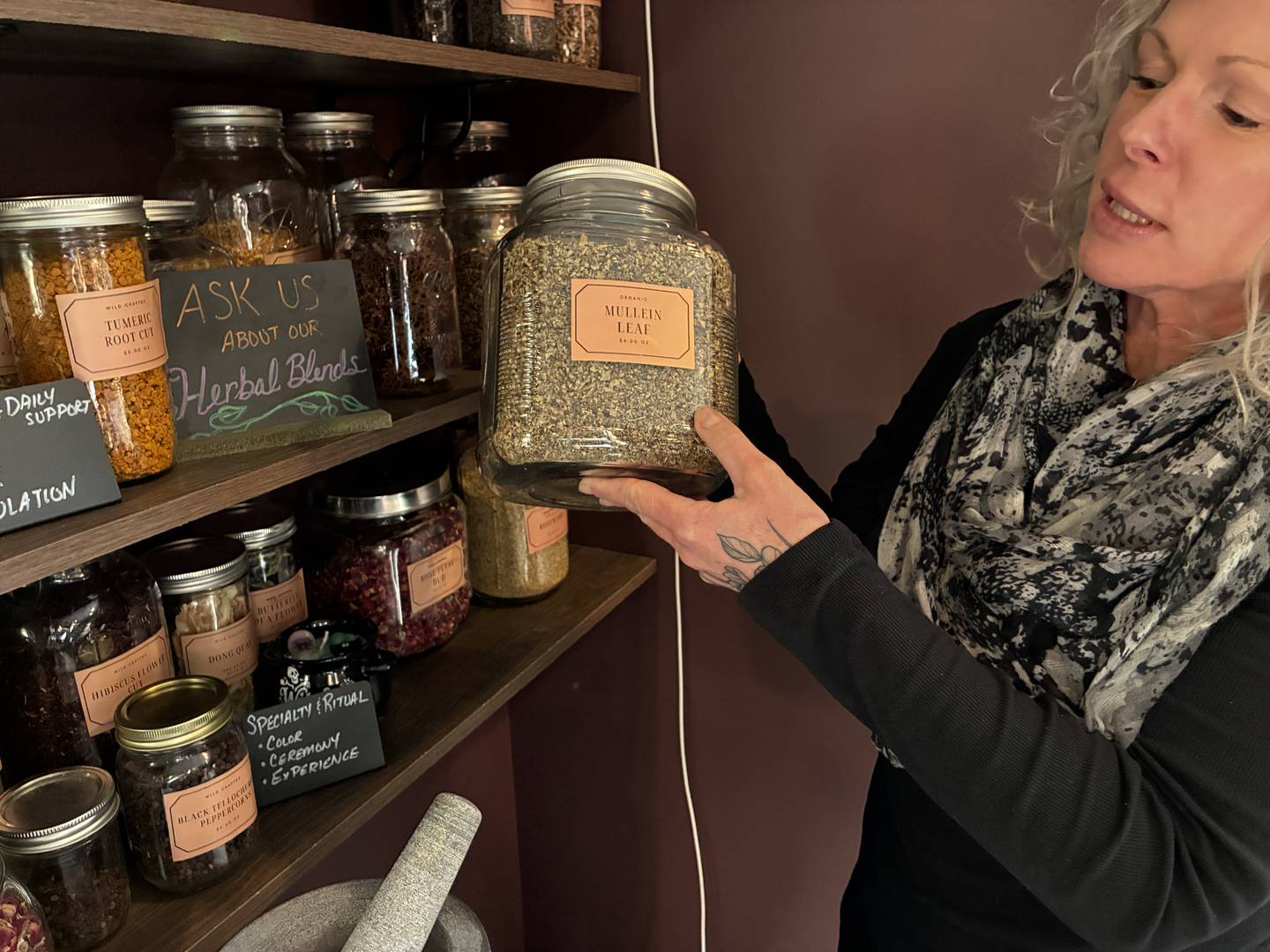 Co-owner Carrie Ozog offers herbs and custom herbal tea blends among the products at McHenry's Rooted Ritual Apothecary at 1309 N. Green St. The store offers handmade, eco-friendly and sustainable goods and opened on Feb. 8, 2026.
