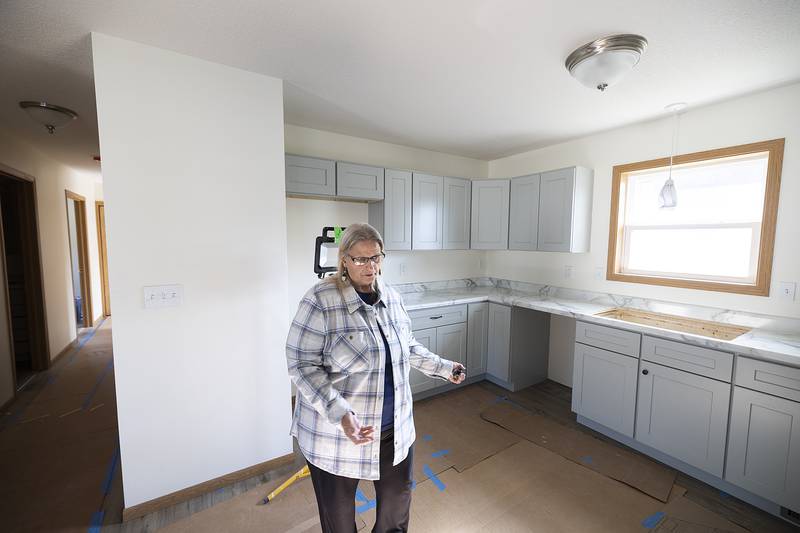 Dixon Habitat for Humanity Chairperson for Family Support Clara Harris tours the latest home being built by the program. After 30 plus years, Harris is retiring from the volunteer position.