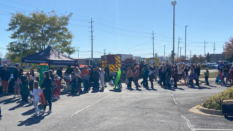 Costumed children line up for the Halloween festivities at Yorkville's Biz Boo! local business event on Oct. 19.