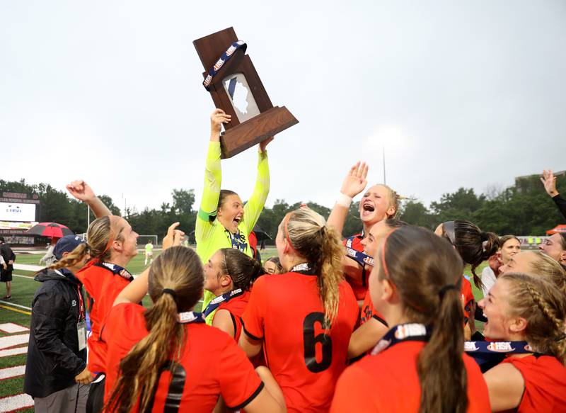 Crystal Lake Central players celebrate their win over Triad in the Class 2A state championship game at North Central College in Naperville on Saturday, June 1, 2024.