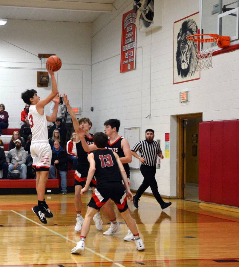 LaMoille's Tyler Billhorn shoots against Amboy on Saturday, Dec. 2 at Dean Madsen Gymnasiun in LaMoille. The theClippers won 51-42. The Lions stand 3-7 on the season.