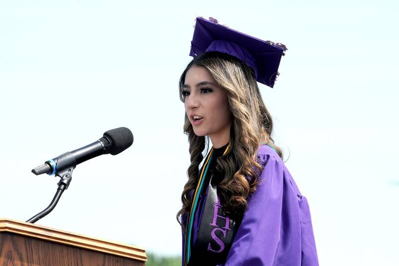 Class president Allison Nunez speaks after the graduates accepted their diplomas during Plano High School's graduation ceremony on the football field, Sunday, May 19, 2024.