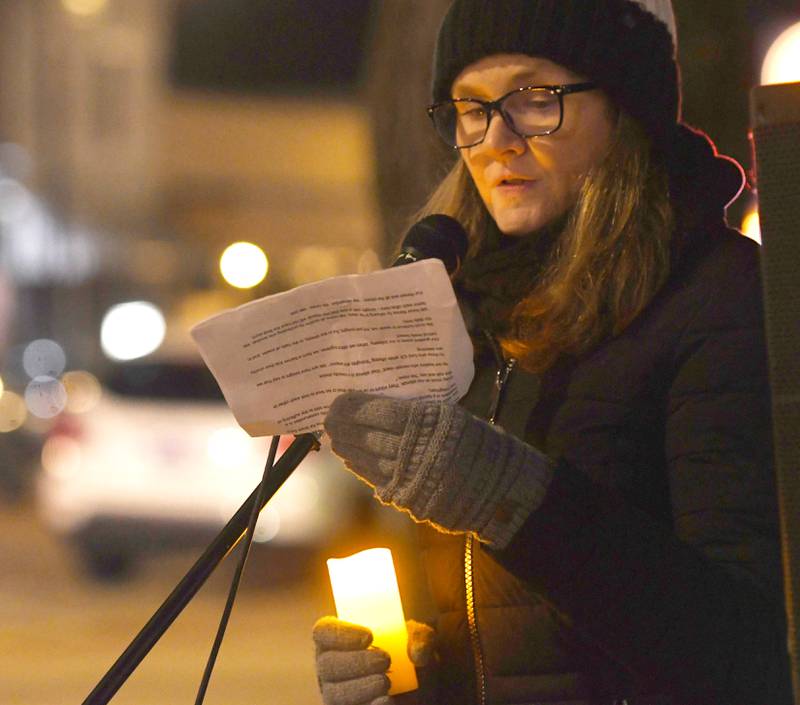 Abbey Harris  of Indivisible of Ogle County speaks during a candlelight vigil in Oregon on Friday, Jan. 9, 2026 for Renee Nicole Good.