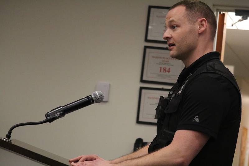 Officer Chris Sullivan speaks Feb. 13, 2023 at the DeKalb City Council meeting.