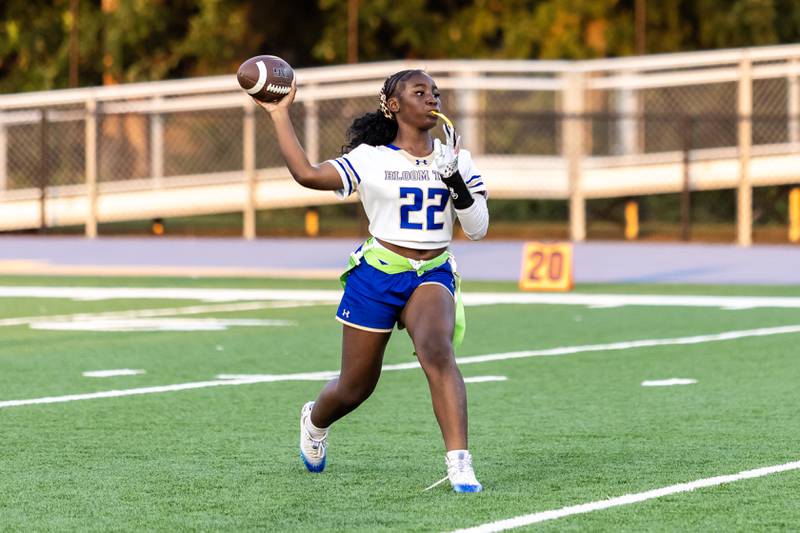 Bloom’s Karson Giles prepares to pass during a varsity flag football game at Joliet Central on Sept. 11, 2025.