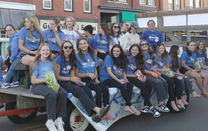 The Princeton High School volleyball team rides during the homecoming parade on Thursday, Sept. 25, 2025 along South Main Street in Princeton .