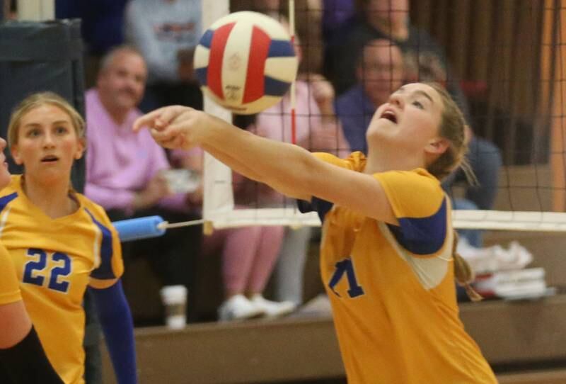 Logan's Libby Sierens returns a hit from Rockford-Marshall during the IESA Class 3A eighth-grade Regional final game on Thursday, March 13, 2025 at Logan Junior High School in Princeton.