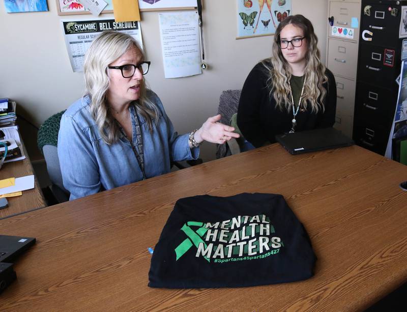 Maryellen Spicer (left) and Mallory Wolf, social workers at Sycamore High School, talk Wednesday, April 16, 2025, at the school about the Student-Athlete Support Coalition that they are a part of that gives support to student athletes at the school.