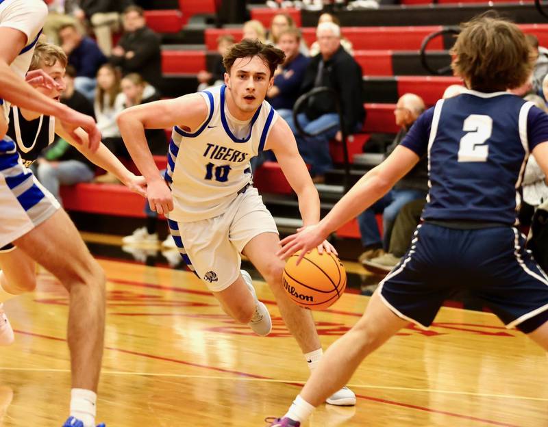 Princeton's Gavin Lanham drives against Fieldcrest Tuesday night at Hall High School.