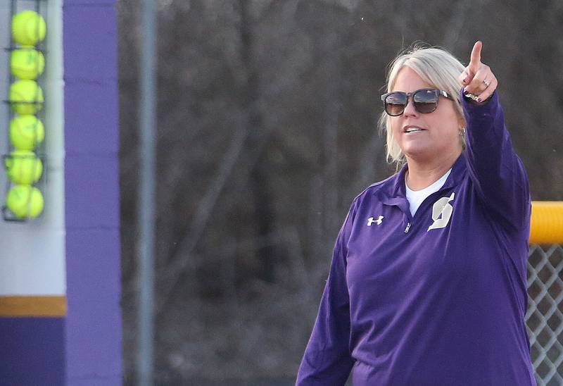 Serena head softball coach Kelly Baker coaches her team while playing Marquette on Wednesday, March 26, 2025 at Serena High School.