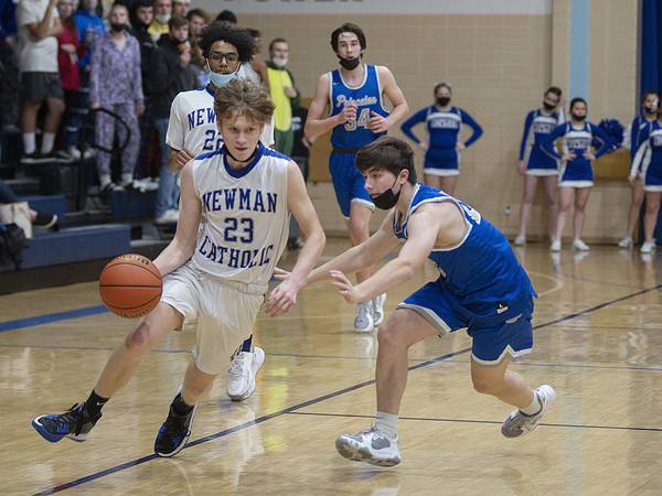Boys basketball: Newman survives late Kewanee rally, keeps TRAC championship hopes alive with win