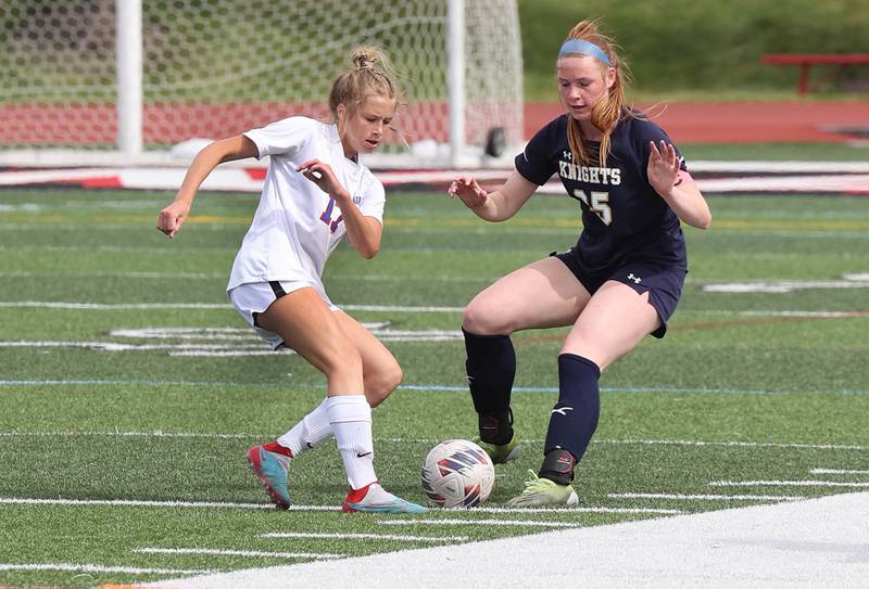 Pleasant Plains' Hailey Sobieski (left) and IC Catholic Prep's Maura Grogan go after the ball during their IHSA Class 1A state girls soccer third place game Saturday, May 27, 2023, at North Central College in Naperville.