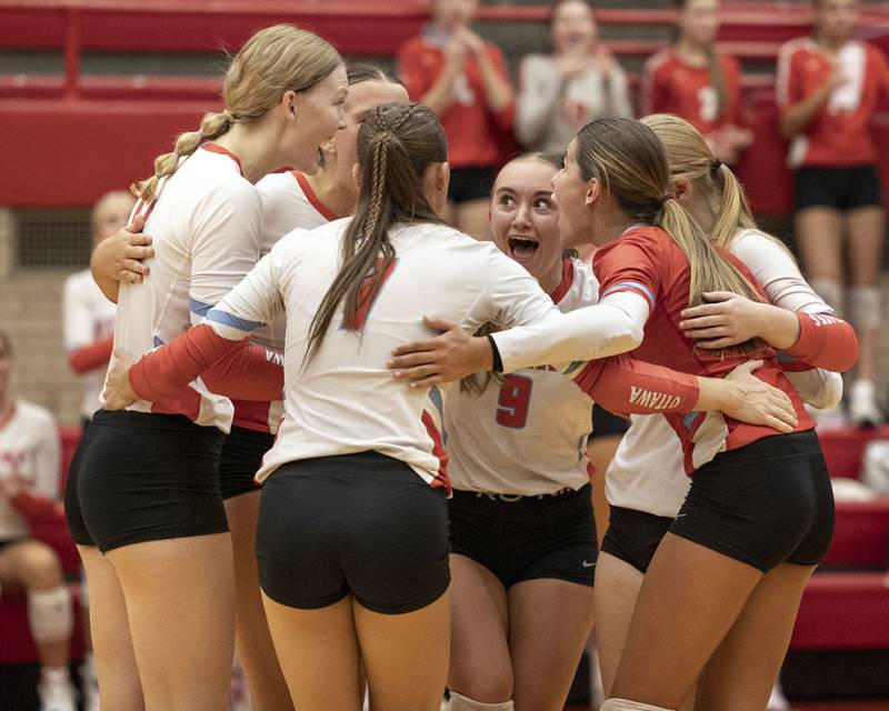Ottawa's volleyball team huddles after scoring point on Thursday, Sept. 18, 2025 at Ottawa High School in Ottawa.
