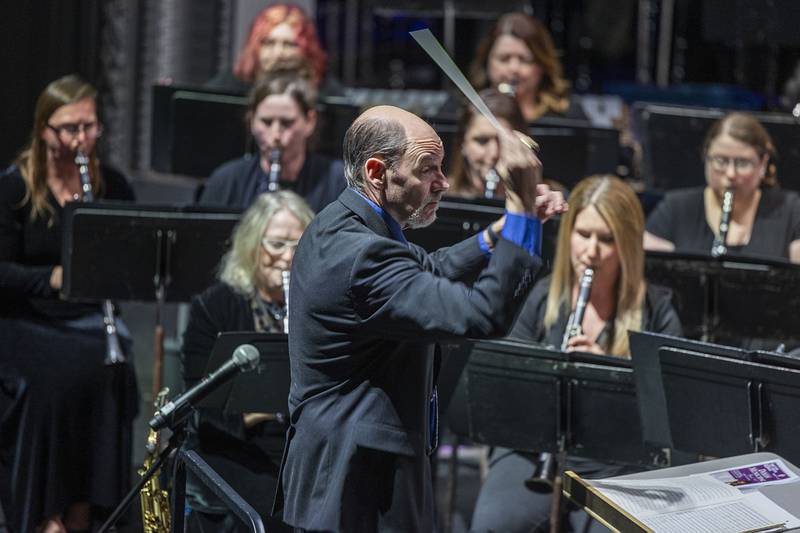 Conductor Jon James leads his Dixon Municipal Band Saturday, March 4, 2023 during their spring show at the Dixon Historic Theatre.