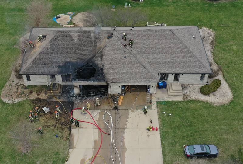 An aerial view of a structure fire in the 600 block of U.S. Route 6 on Tuesday, April 1, 2025 in La Salle. Fire departments from Peru, La Salle, Utica, Troy Grove, Wallace, Spring Valley and Oglesby were dispatched just before 2:30 to a one-story dublex home.