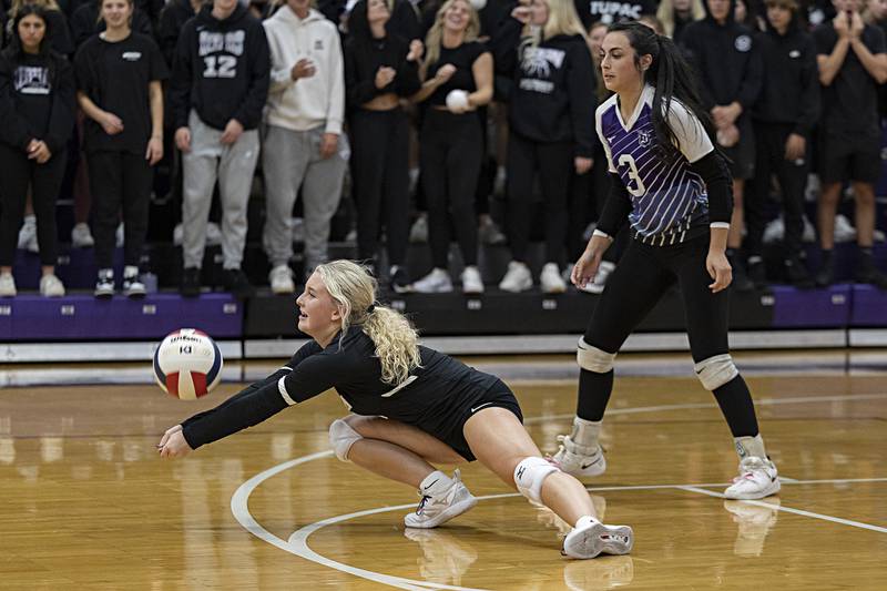 Dixon’s Emma Olson passes the ball against Rock Falls Thursday, Oct. 12, 2023 at Dixon High School.