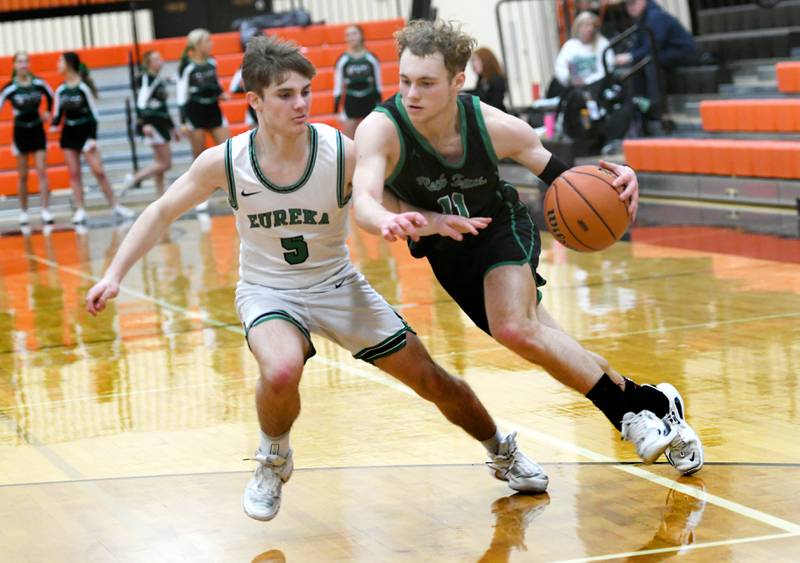 Rock Falls' Gavin Sands drives on Eureka's Mason Schoolcraft during Thursday action at the 2A Byron Regional semifinal.