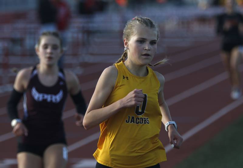 Jacobs’ Lennox Szymonik cruises to victory in the 3,200 meter run on Thursday, May 7, 2026, during the Fox Valley Conference Girls Track and Field Meet at Huntley High School.