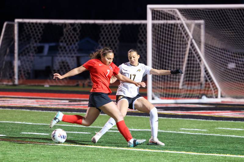 Bradley-Bourbonnais' Aaliyah Lanum is defended by Herscher's Leia Haubner during Bradley-Bourbonnais' 4-3 victory on Monday, April 6, 2026.