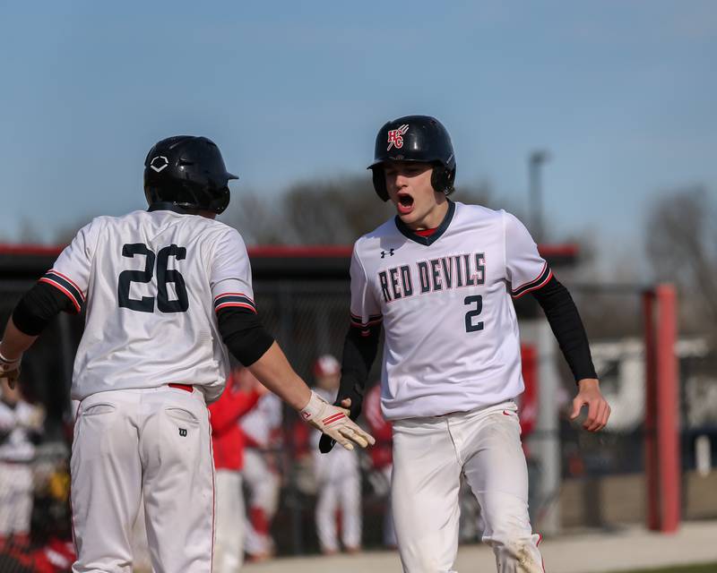 Hinsdale Central's Ben Oosterbaan (2) crosses the plate during baseball game between Lyons at Hinsdale Central. April 19, 2022.