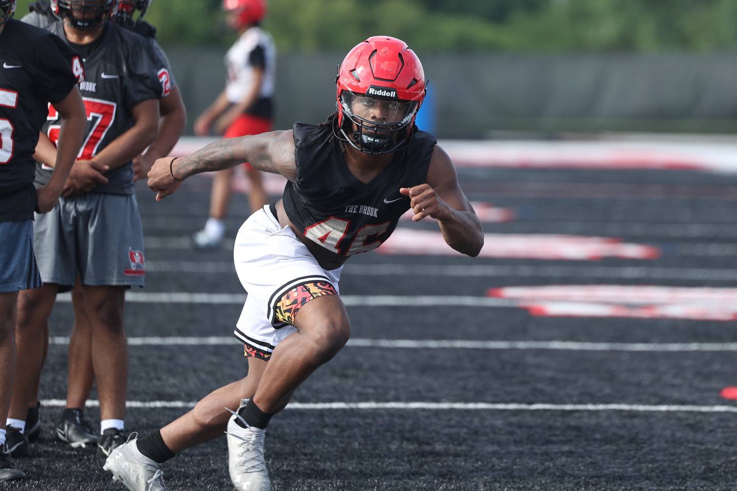Bolingbrook’s Chris Ellen locks in on a runner during a defensive drill at the first day of practice on Monday, Aug. 7, 2023 in Bolingbrook.