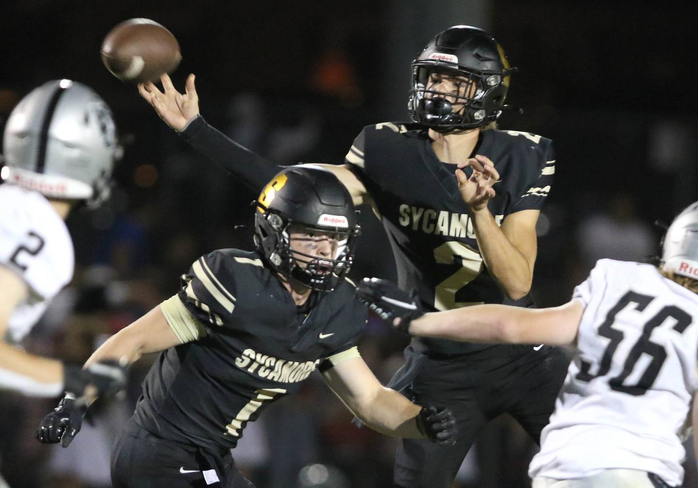 Sycamore's Elijah Meier throws a pass over the Kaneland defense during their game Friday, Sep. 10, 2021 at Sycamore High School.