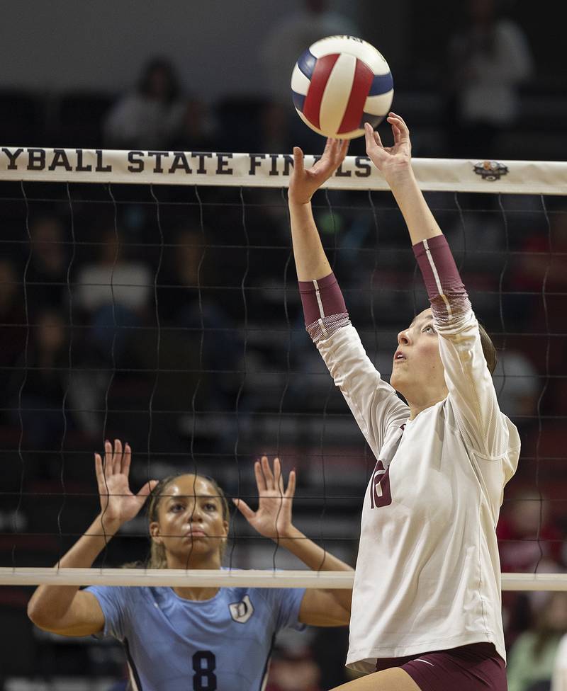 Prairie Ridge's Addison Smith sets the ball against DePaul College Prep Saturday, Nov. 16, 2024, in the Class 3A third place state volleyball match at CEFCU Arena in Normal.