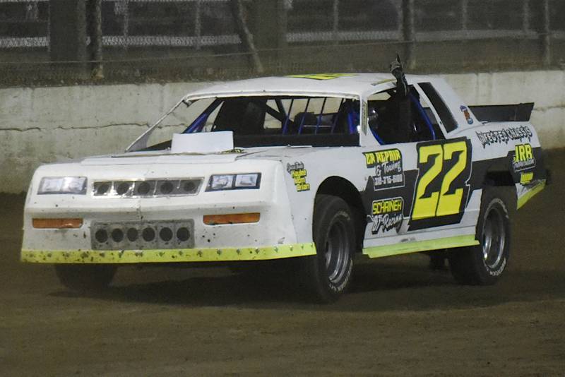 Braiden Keller gestures a No. 1 out of his window after winning his factory stock heat race at Kankakee County Speedway Friday, May 16, 2025. Keller would go on to win both the factory stock and pro modified feature races on the night.