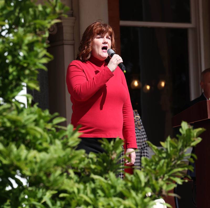 Terri Crain Goodman sings the “Star Spangled Banner” Monday, May 26, 2025, during the Memorial Day ceremony at Ellwood House in DeKalb.