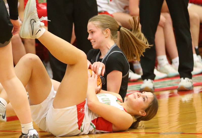 Kaneland's Samantha Kerry forces a jump ball with L-P's Phoebe Shetterly on Wednesday, Jan. 15, 2025 in Sellett Gymnasium at L-P High School.