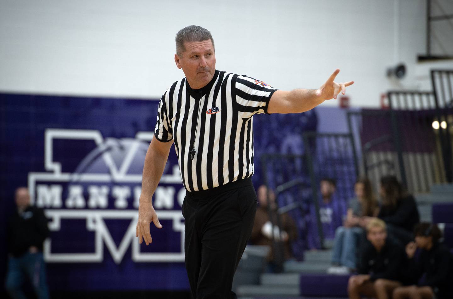 Joe Ewers officiates a game between Peotone and IC Catholic in the Thanksgiving tournament at Manteno High School on Monday, November 24, 2025.