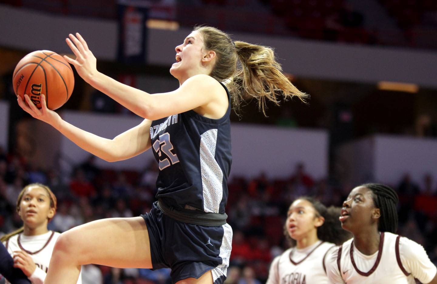 Nazareth Academy's Grace Carstensen goes up for a shot during the Class 3A girls basketball state semifinal against Peoria at Redbird Arena in Normal on Friday, March 3, 2023.