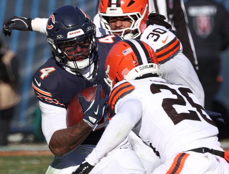 Chicago Bears running back D'Andre Swift looks to get by Cleveland Browns cornerback Myles Harden during their game Sunday, Dec. 14, 2025, at Soldier Field in Chicago.