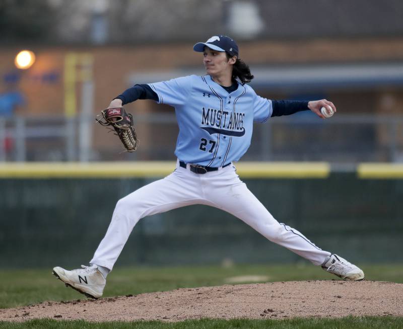 Downers Grove South’s Lucas Costello delivers a pitch against Willowbrook during a game in Downers Grove on Tuesday, April 5, 2022.