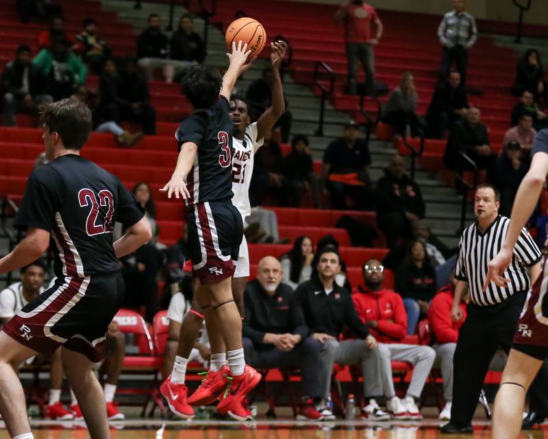 Bolingbrook's Kendall Cutler (23) shoots a jumper during their basketball game between Plainfield North at Bolingbrook, Friday Dec 13, 2024 in Bolingbrook.