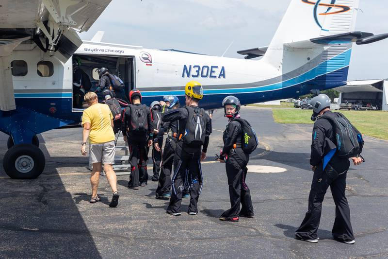 Skydivers enter plane on Friday, July 11, 2025 at Skydive Chicago in Ottawa.