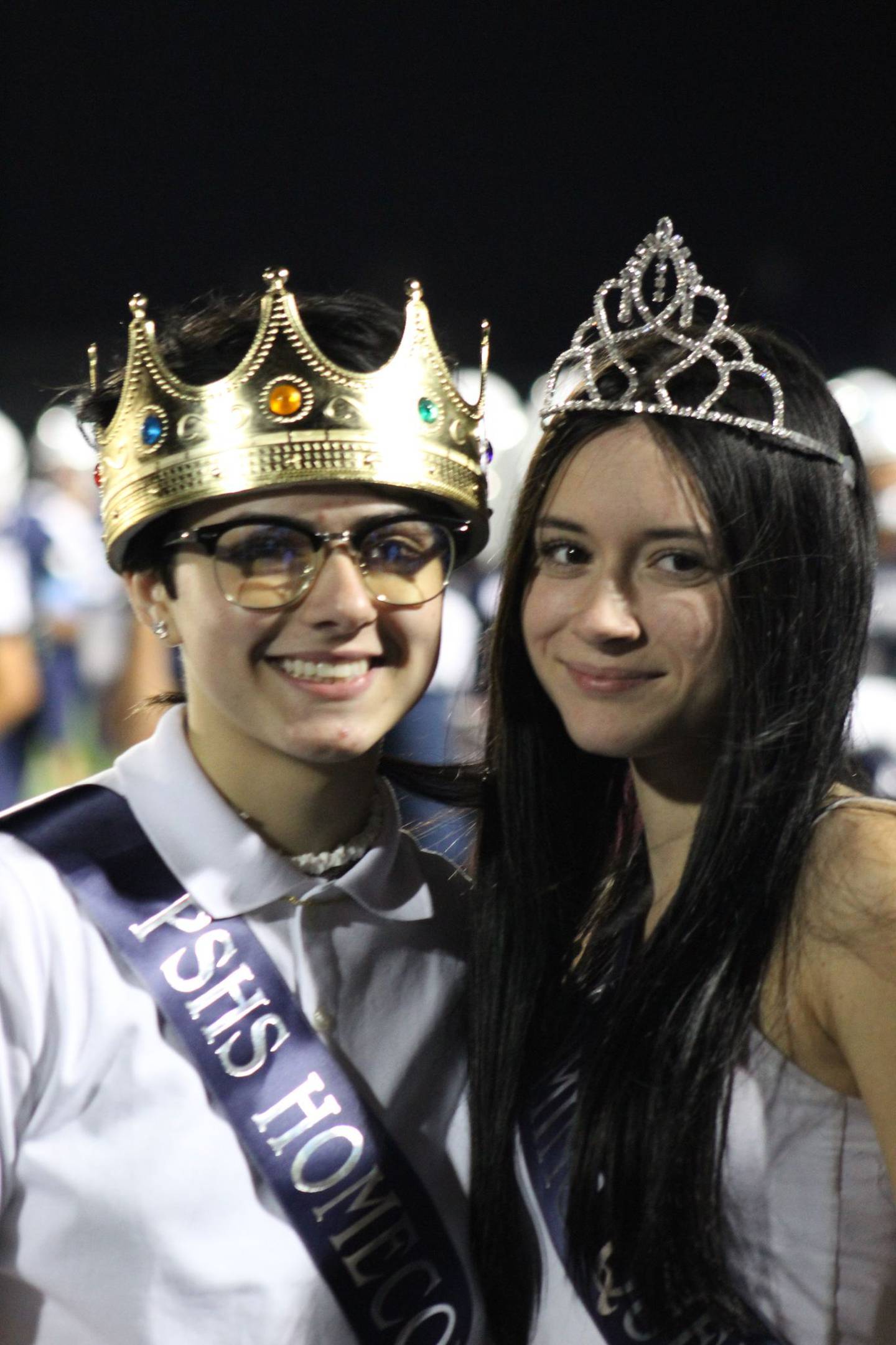 Emily Novak (right) and her partner Gianna Pometta are seen at Plainfield South High School's homecoming dance on Saturday night. The girls thought they were crowned king and queen but District 202 said no one was king and queen this year; the girls were senior attendants in the court.